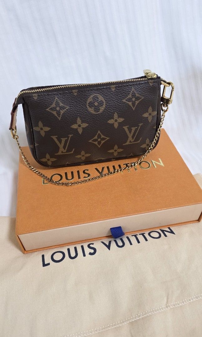 Louis Vuitton Mini Pochette Accessoires Monogram Canvas (Category: Luxury Bags & Wallets) located in Caloocan City. Submitted by mademoisellegirl (Listing ID 1389686913, Image 1). Description: Louis Vuitton Mini Pochette Accessoires Monogram Canvas Rank SA Comes with dustbag and box Comes with FREE gold chain Used few times only. Excellent Condition. You can add a LV Strap or gold chain strap to make it cross body bag :).
