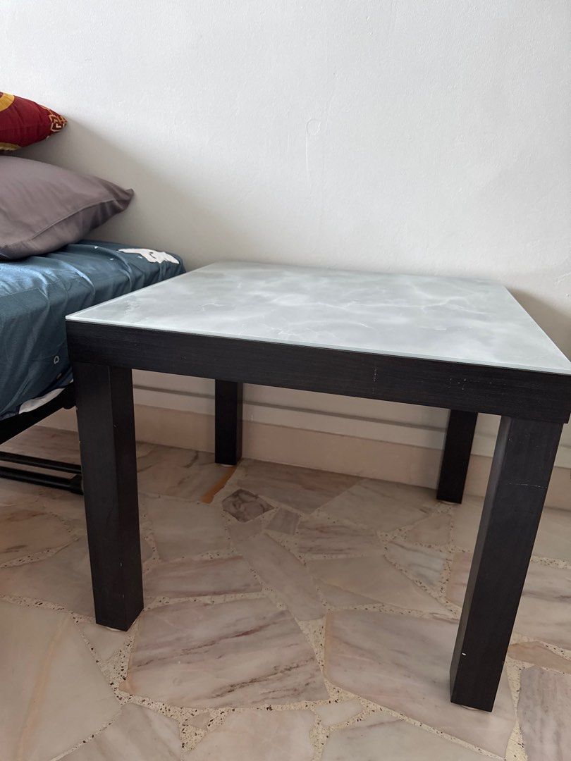 Side Table (Category: Tables & Sets) located in Singapore. Submitted by hero1311 (Listing ID 1389706177, Image 2). Description: - Stylish side table - Marble-look top - Dark wooden legs - Dimensions: 55cmx 55cm and high 46cm. - Ideal for living room or bedroom.
