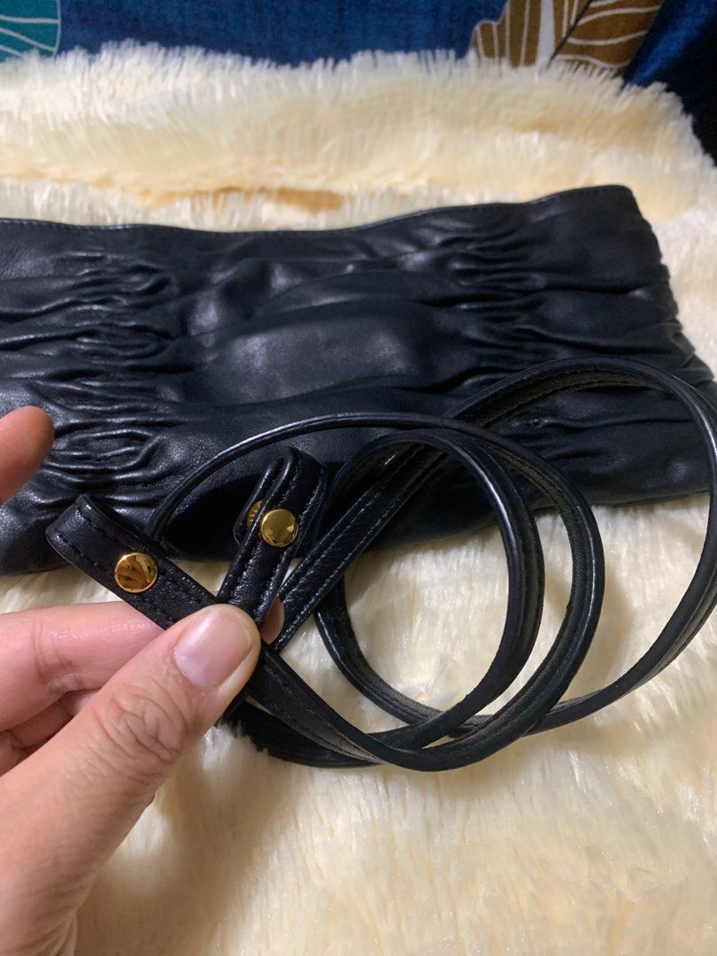 MK wallet sling (Category: Luxury Bags & Wallets) located in Manila. Submitted by yanakolekzione (Listing ID 1389834202, Image 2). Description: Original Preloved Signs of usage Soft leather Sling not adjustable Sling lenght - 36.5 inches.