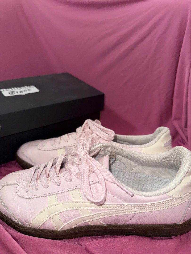 Onitsuka Tiger Tokuten Crystal Pink Sneakers (Category: Sneakers) located in Singapore. Submitted by hamstercado (Listing ID 1389719549, Image 2). Description: - Onitsuka Tiger Tokuten sneakers - Color: Crystal Pink - Size: US Women's 7.5 / EUR 39 - Condition: Lightly used - Comes with original box - Minimal wear on soles NOTE There are small black ink marks on the insole of the left shoe (see photo for details). They are minor and do not affect 