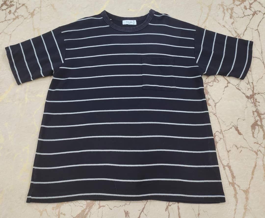 Plus one (Category: Tshirts & Polo Shirts) located in Kuala Lumpur. Submitted by beymi_shop (Listing ID 1389831236, Image 1). Description: Plus one shirt 📏Dada 20" 📏Labuh 25" 📏Bahu 19" 🎨 Colour : Black & white stripe 🪄 Condition : 8.5/10 📦Postage : SM +Rm8 / SS +Rm15 📍Self pickup : Kota bharu, kelantan 📩 Pm for more details : 013-9795263.