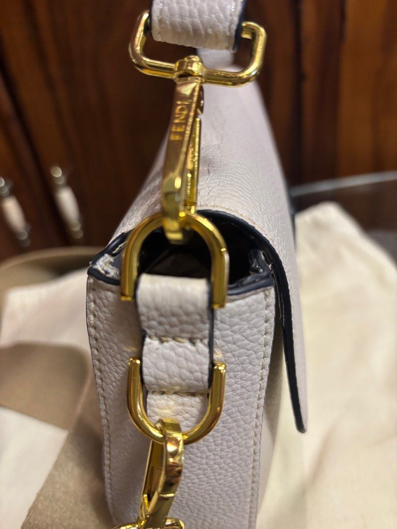 Preloved Fendi 2 way leather bag (Category: Luxury Bags & Wallets) located in Imus. Submitted by bagsofblessings24 (Listing ID 1389709592, Image 3). Description: Preloved Fendi Leather bag Handbag or crossbody bag Length 10.5in x Height 5in x Bottom 2.25in Coded with dustbag Excellent condition, only flaw is the crease of leather at the top view(pls see last photo) Negotiable price Shipping fee c/o buyer Disclaimer: Bags of Blessings is not assoc