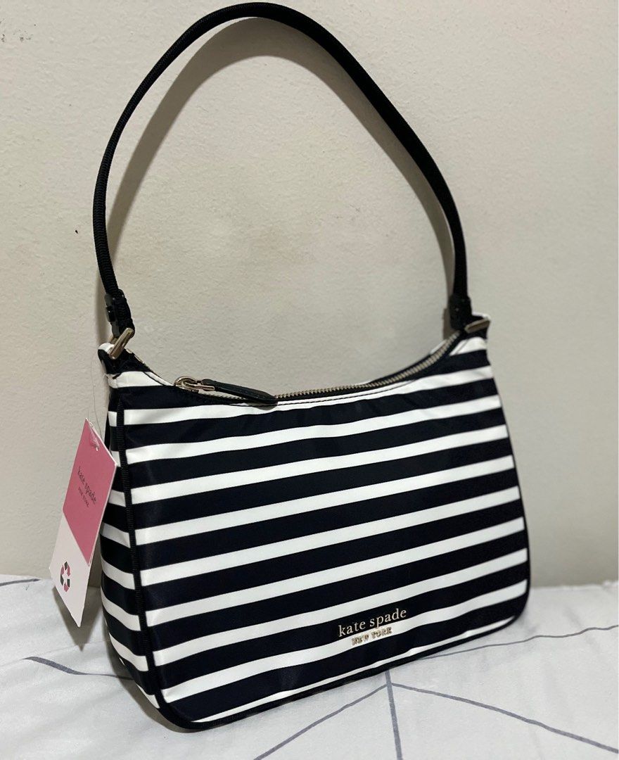 SELLING LOW: SAM NYLON SHOULDER (Category: Luxury Bags & Wallets) located in Quezon City. Submitted by dropshopselections (Listing ID 1389684278, Image 1). Description: original unused approx 9.5 x 6 x 3.5 inches.