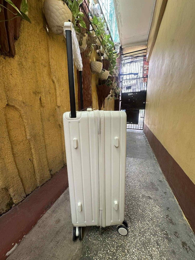 Travel Basic MEDIUM hard case luggage WHITE (Category: Luggage) located in Manila. Submitted by geastoystoreatbp (Listing ID 1389706578, Image 2). Description: onhand and ready to ship.