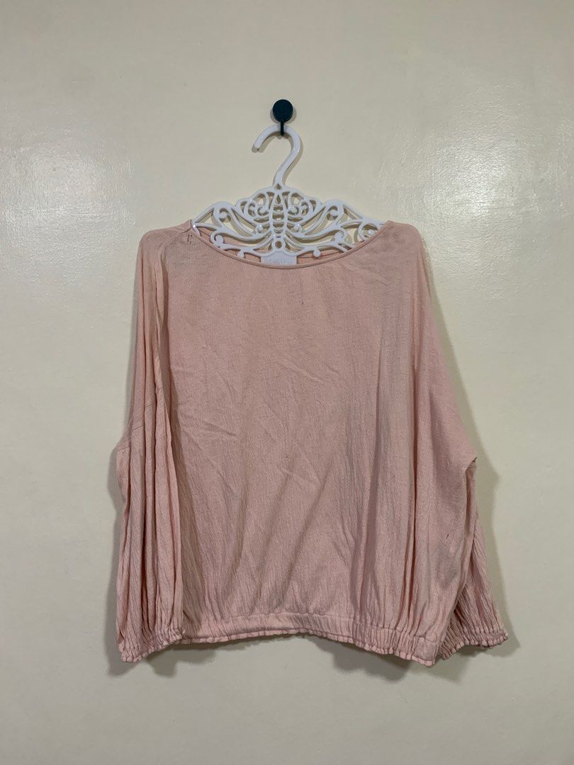 Uniqlo Blush Pink Blouse (Category: Blouses) located in Quezon City. Submitted by closet.decluttered (Listing ID 1389843559, Image 1). Description: With minor holes.