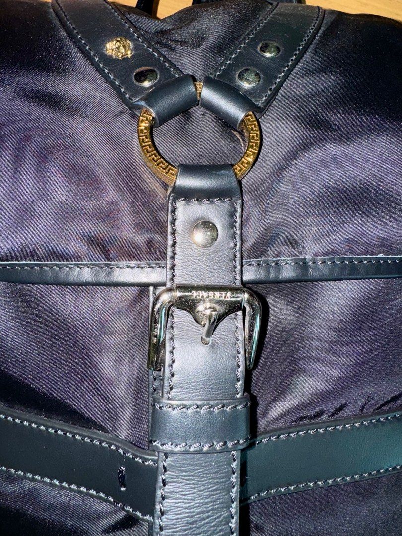 Versace Backpack (Category: Bags & Wallets) located in Shah Alam. Submitted by obeep (Listing ID 1389840290, Image 2). Description: 💯 Versace Bqckpack ♨️ Light weight water repellent nylon and premium leather 💎 Premium quality - Made in Italy ✅ NFC Tag 💝 Preloved item to clear the wardrobe 🏆 Buy 2 or more item will get additional 10% discount.