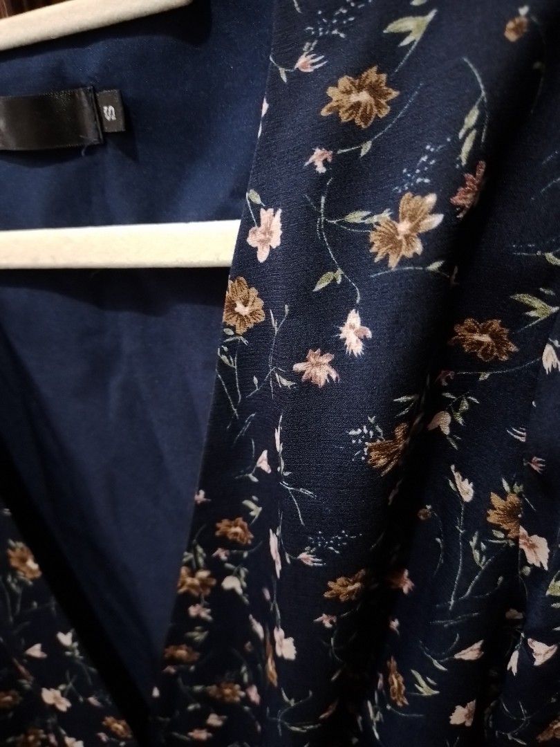 wrap up dress (Category: Dresses) located in Quezon City. Submitted by happyleafff (Listing ID 1389710493, Image 3). Description: Brand: Something Borrowed Navy blue floral design, flared sleeves, wrap up dress Size: Can fit XS-M frame Used it twice Rfs: decluttering - no when worn & rush shipping - items are preloved. please manage expectations. - pay as you order. - mode of payment: gcash, bdo.