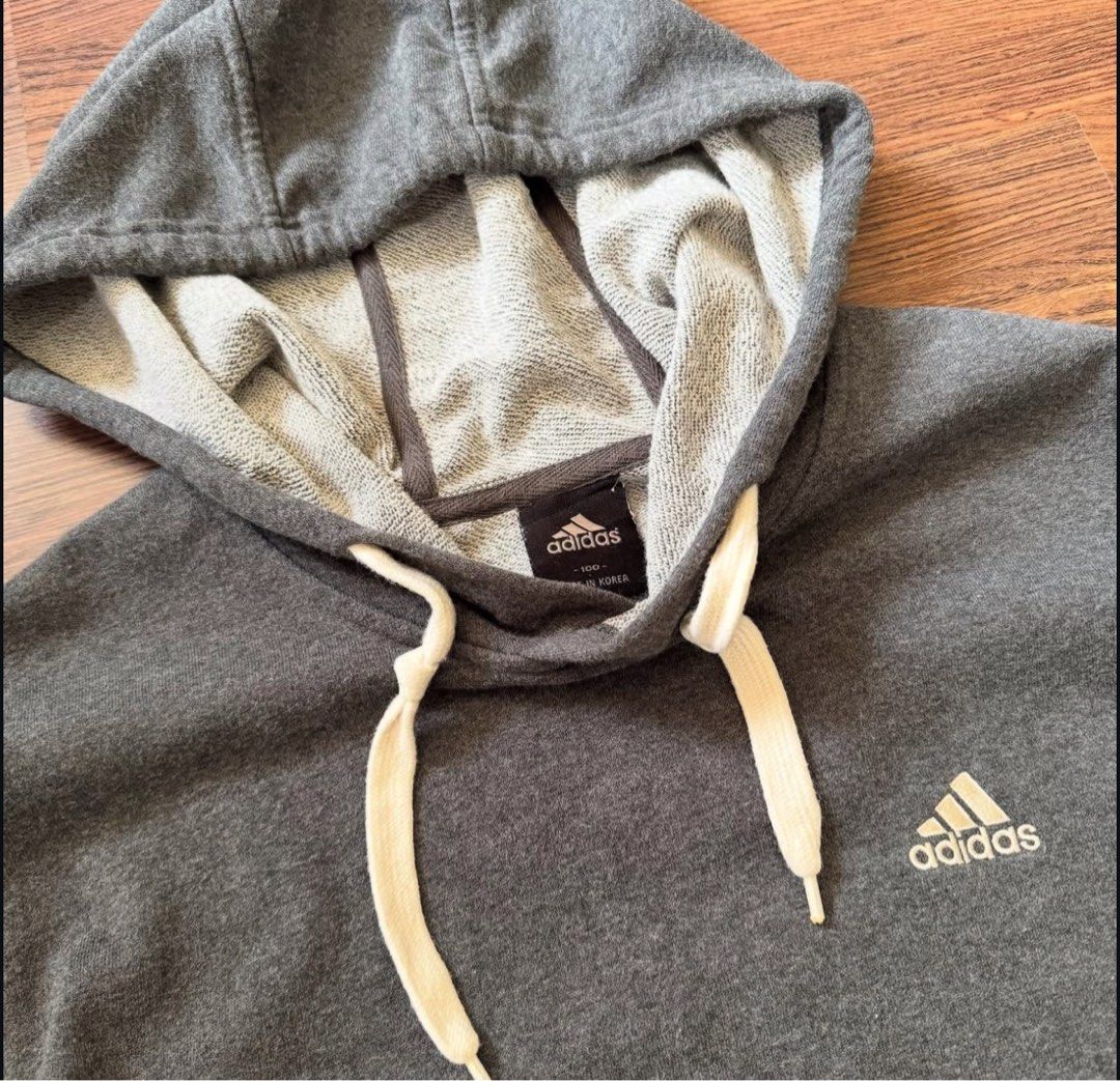 Adidas hoodie (Category: Coats, Jackets and Outerwear) located in Binan City. Submitted by luckythriffs (Listing ID 1389856957, Image 2). Description: Adidas Hoodie Condition: 9.5/10 Issues: none ~Dimes~ Fits M Length: 27.5” Width: 21”.