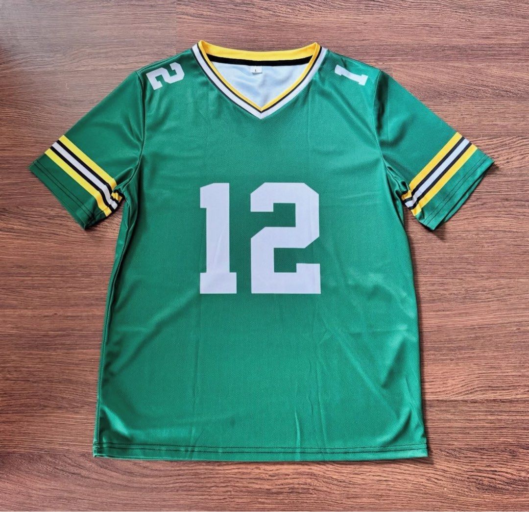 American football jersey (Category: Activewear) located in Binan City. Submitted by luckythriffs (Listing ID 1389857232, Image 1). Description: American Football Jersey Condition: 10/10 Issues: none ~Dimes~ L on tag Length: 27.5” Width: 20”.