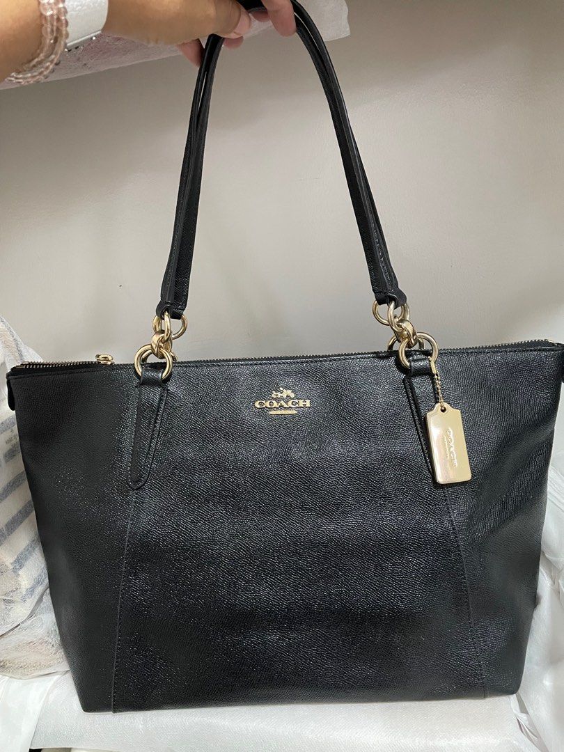 Authentic Coach Ava Crossgrain leather tote (Category: Luxury Bags & Wallets) located in Guiguinto. Submitted by prelovedinc2024 (Listing ID 1389850286, Image 1). Description: guaranteed authentic, bought in Japan with signs of use on hardwares gold hardwares - with fadings and scratches peeled off creed no rubs, no cracks, very clean last photo is only for reference size: 12.5x10.5x5”.
