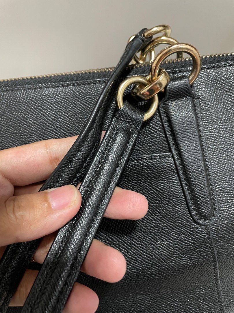 Authentic Coach Ava Crossgrain leather tote (Category: Luxury Bags & Wallets) located in Guiguinto. Submitted by prelovedinc2024 (Listing ID 1389850286, Image 3). Description: guaranteed authentic, bought in Japan with signs of use on hardwares gold hardwares - with fadings and scratches peeled off creed no rubs, no cracks, very clean last photo is only for reference size: 12.5x10.5x5”.