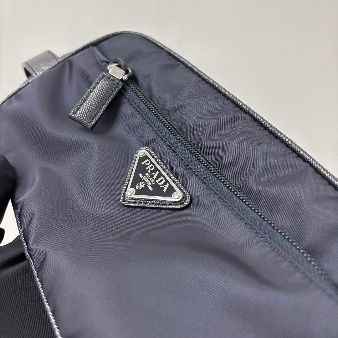 Authentic Prada Re-nylon Travel Pouch (Category: Luxury Bags & Wallets) located in Taguig. Submitted by slggg (Listing ID 1335310206, Image 2). Description: Never been used Prada Re-nylon Travel Pouch. ✔Microchipped ✔Can be checked using NFC tools Includes: - Dust bag - Authenticity Card Meet up: Taguig/BGC area.