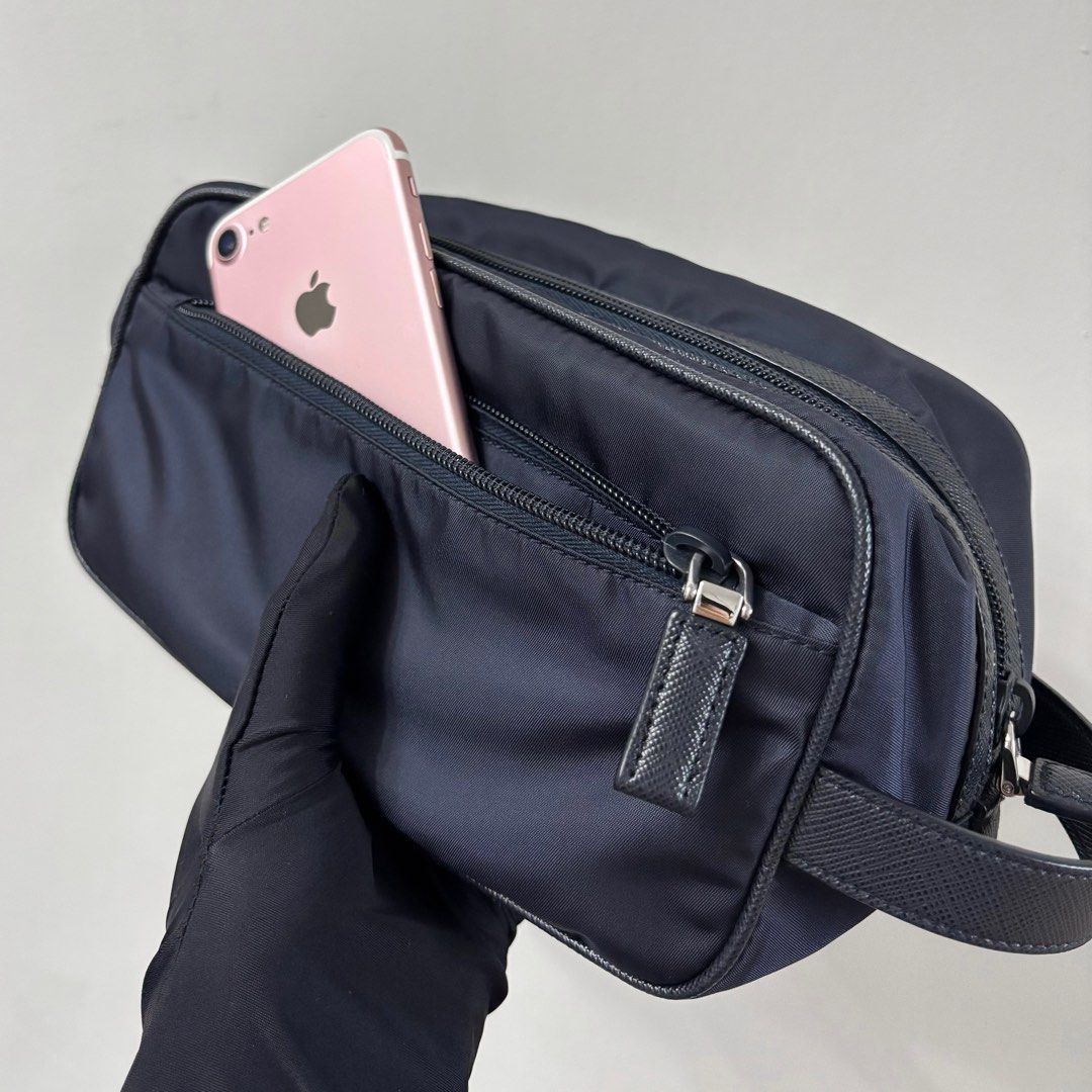 Authentic Prada Re-nylon Travel Pouch (Category: Luxury Bags & Wallets) located in Taguig. Submitted by slggg (Listing ID 1335310206, Image 3). Description: Never been used Prada Re-nylon Travel Pouch. ✔Microchipped ✔Can be checked using NFC tools Includes: - Dust bag - Authenticity Card Meet up: Taguig/BGC area.