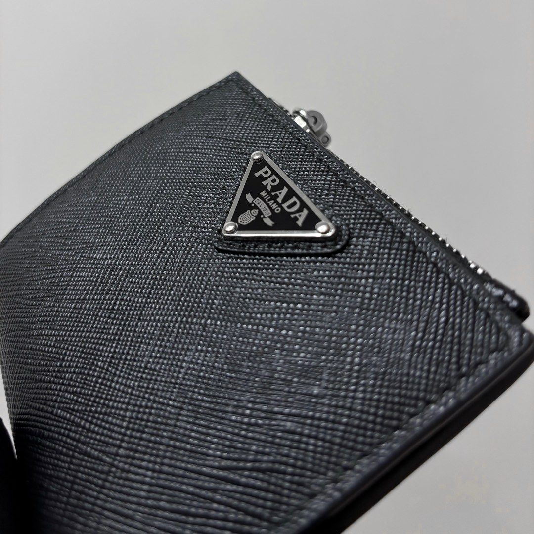 Authentic Prada Small Saffiano Leather Wallet (Category: Luxury Bags & Wallets) located in Taguig. Submitted by slggg (Listing ID 1389898850, Image 2). Description: Never been used Prada Small Saffiano Leather Wallet. ✔Microchipped ✔Can be checked using NFC tools Includes: - Authenticity Card - Dust bag - Felt Paper - Box & Ribbon - Paper bag Meet up: Taguig/BGC area.