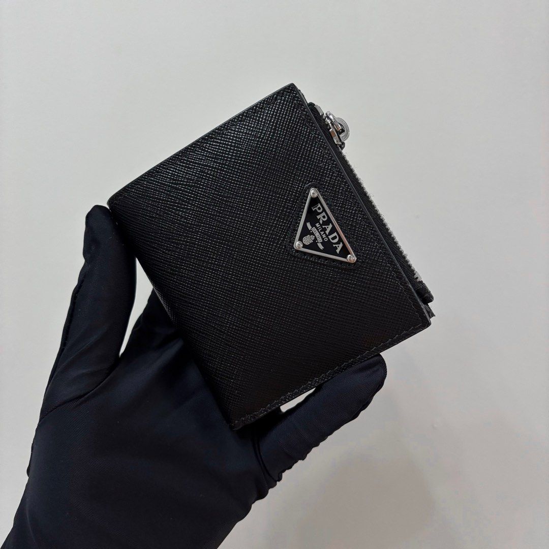 Authentic Prada Small Saffiano Leather Wallet (Category: Luxury Bags & Wallets) located in Taguig. Submitted by slggg (Listing ID 1389898850, Image 1). Description: Never been used Prada Small Saffiano Leather Wallet. ✔Microchipped ✔Can be checked using NFC tools Includes: - Authenticity Card - Dust bag - Felt Paper - Box & Ribbon - Paper bag Meet up: Taguig/BGC area.