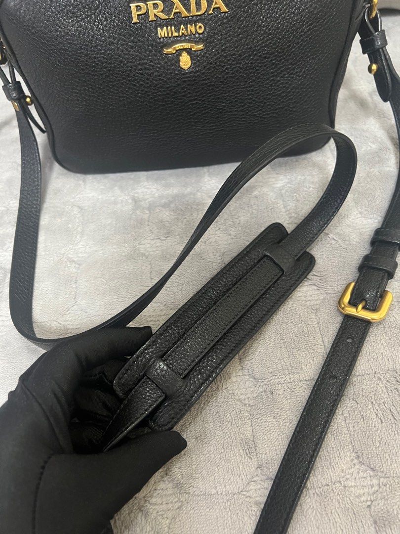 Authentic Prada Vitello Daino Camera Bag (Category: Luxury Bags & Wallets) located in Quezon City. Submitted by DZignersbyZsa (Listing ID 1389851245, Image 3). Description: Authentic Prada Vitello Daino Camera bag In very good condition comes with authenticity card and booklet clean in and out No corner rubs No tarnish on hardware ✨More detailed photos available upon request..