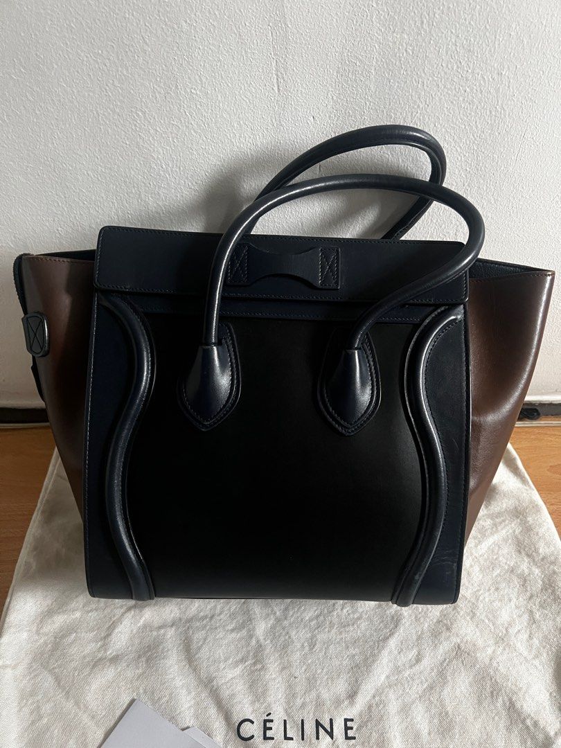 Celine Micro Luggage Super Sale!! (Category: Luxury Bags & Wallets) located in Quezon City. Submitted by jumpystreet (Listing ID 1389924742, Image 2). Description: Celine Tricolor Micro Luggage. Navy blue and brown color. 💯 authentic. Very good condition. 8.5/10 rating.