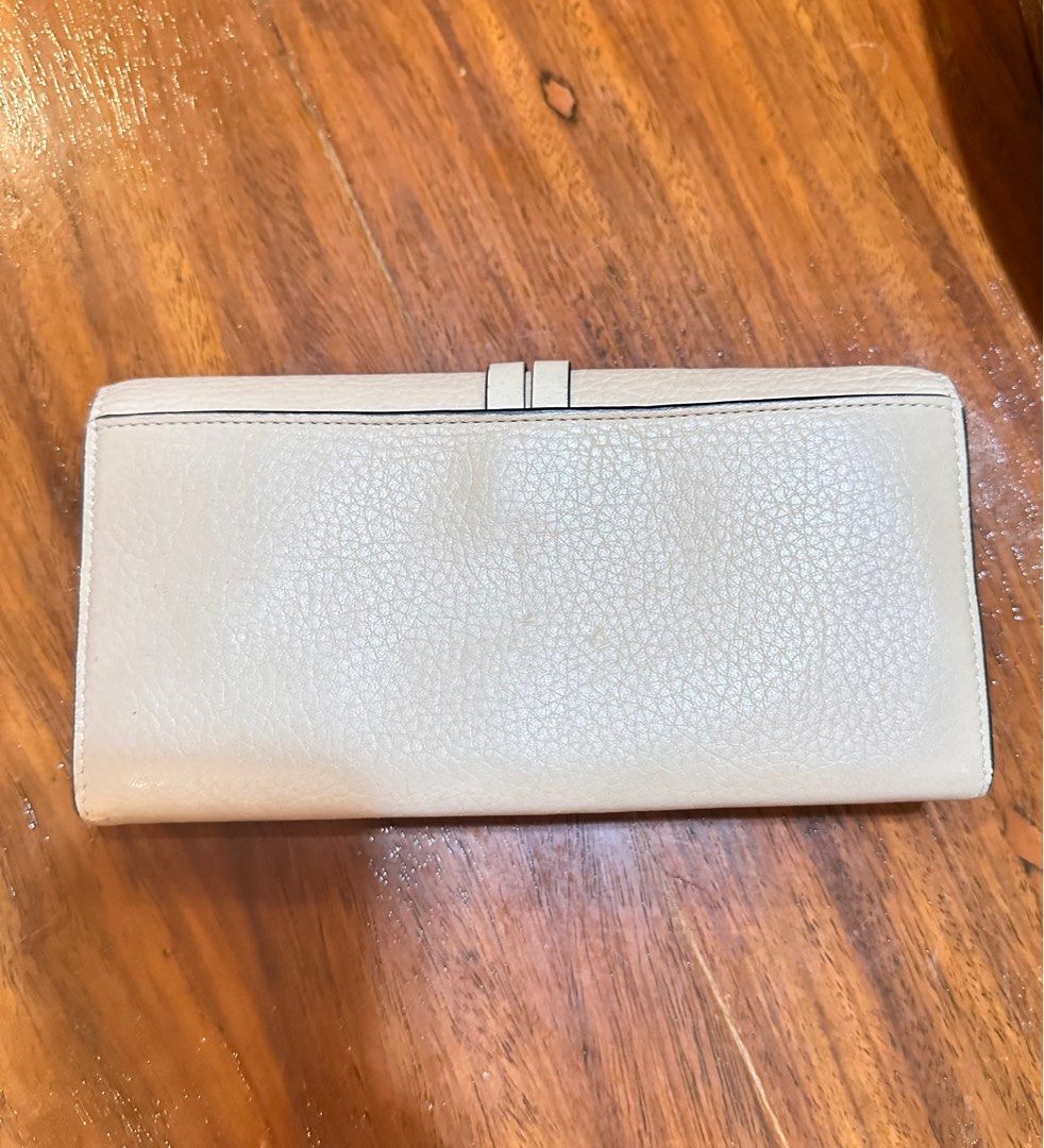 Chloe Wallet (Category: Wallets & Card holders) located in Puerto Princesa. Submitted by rorysroomdeclutter (Listing ID 1390009159, Image 3). Description: Price is nego! Guaranteed Authentic w/ authenticity certificate Chloe Alphabet Wallet with Flap in Grained Leather Lost charm :( Personally bought this in Japan Grained & shiny calfskin Main lining: Lambskin - Snap button closure - 1 main compartment - 1 flat pocket - 1 back outside flat pocket