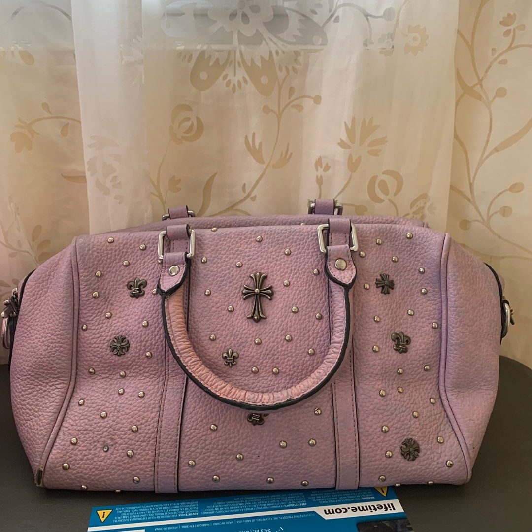 Chrome Hearts Studded Lilac-Pink Handbag (Category: Luxury Bags & Wallets) located in Rizal. Submitted by jcccc379 (Listing ID 1389906026, Image 1). Description: Unique and rare Chrome Hearts leather handbag in a lilac-pink shade. Features cross and fleur-de-lis studs all over, with signature Chrome Hearts detailing. Condition: • Preloved, with signs of use • Has a 1 missing stud • Scratch at the bottom part (only noticeable when bag is placed do