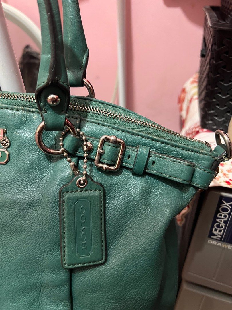 COACH MADISON HANDBAG (Category: Luxury Bags & Wallets) located in Navotas City. Submitted by declutteringstuff_ph (Listing ID 1390010234, Image 3). Description: Preloved Original Coach Madison Bag. Comes with a sling bag, but it is damaged. The silver hardware is in good condition. With flaws, visible rubs can be seen in the pictures. Price is negotiable✨.