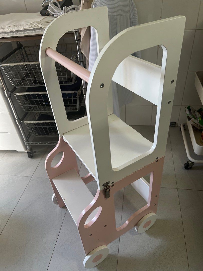 Foldable Learning Tower (Category: Other Kids Furniture) located in Singapore. Submitted by caterpiyarn (Listing ID 1389867327, Image 1). Description: Wooden learning tower that can be folded into kids desk. White and pink You can arrange your delivery or self collection .