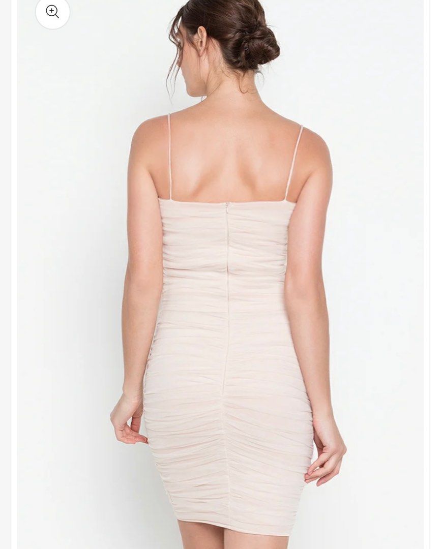 Heather Clothing bustier dress (Category: Dresses) located in Makati City. Submitted by pandora42 (Listing ID 1389902983, Image 3). Description: Heather Clothing - HOT MESH dress - Actual color is the 1st photo - nude - Ruched tulle short dress - Lined - Padded - Square neckline - Spaghetti straps - Back zipper fastening - Neoprene material - refer to the last photo for the measurements Worn once.