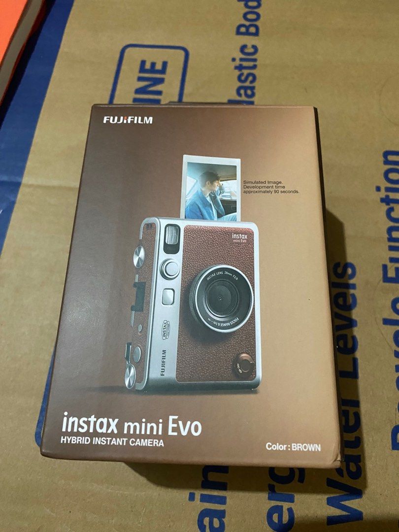 Instax mini Evo (Category: Cameras) located in Manila. Submitted by margierose92875 (Listing ID 1389978045, Image 2). Description: Inclusions: -unit -box -manual -sd card -long strap -original charger Mod: meetup/ lalamove Mop: cash/ gcash.