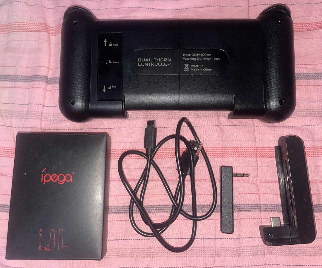 IPEGA WIRELESS CONTROLLER PG-9167 DUAL THORN (Category: Controllers) located in Castillejos. Submitted by yatsumi (Listing ID 1389853536, Image 2). Description: IPEGA Dual Thorn Wireless Controller For: Android/iOS no box.