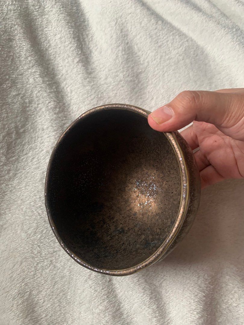Matcha Bowl Chawan Bronze Shimmery Glazed (Category: Coffee & Tea Tableware) located in Manila. Submitted by gabagoolz (Listing ID 1389895361, Image 3). Description: Super pretty in person! When the light catches the bowl it shimmers because of its glittery glazing. Thick and heavy. Standard size of a matcha bowl. Perfect for usucha.
