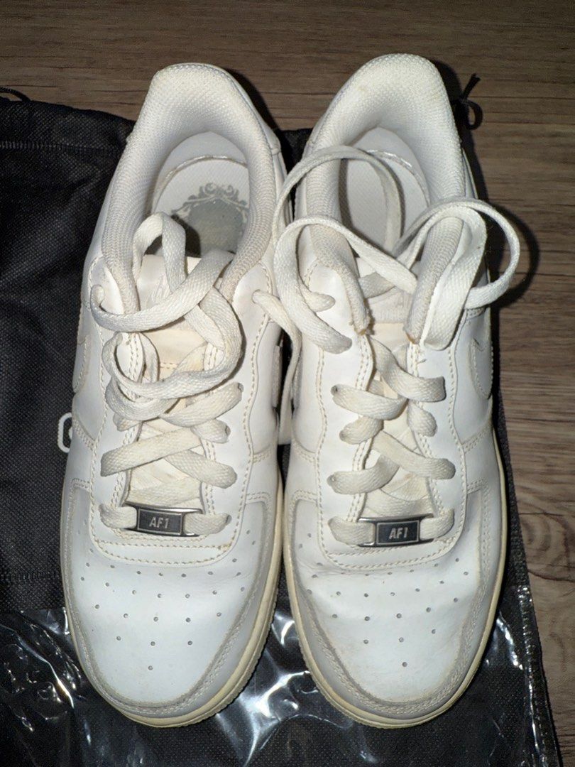 Nike Air Force White Shoes Sz 37 (Category: Sneakers) located in Binan City. Submitted by jayms_closet (Listing ID 1389972246, Image 1). Description: - Nike Air Force Kids' size/version but fits size 36-37 womens, 23.5cm, US 5Y - Old shoes but rarely used - Has yellowing but this can still def be cleaned when rehab-ed - No more box - Don't use it anymore Payment first before shipping. MOP: GCash, BDO, or BPI only Shipping: DF c/o buyer and shall 
