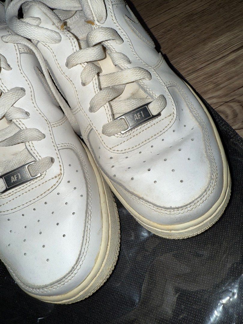 Nike Air Force White Shoes Sz 37 (Category: Sneakers) located in Binan City. Submitted by jayms_closet (Listing ID 1389972246, Image 2). Description: - Nike Air Force Kids' size/version but fits size 36-37 womens, 23.5cm, US 5Y - Old shoes but rarely used - Has yellowing but this can still def be cleaned when rehab-ed - No more box - Don't use it anymore Payment first before shipping. MOP: GCash, BDO, or BPI only Shipping: DF c/o buyer and shall 