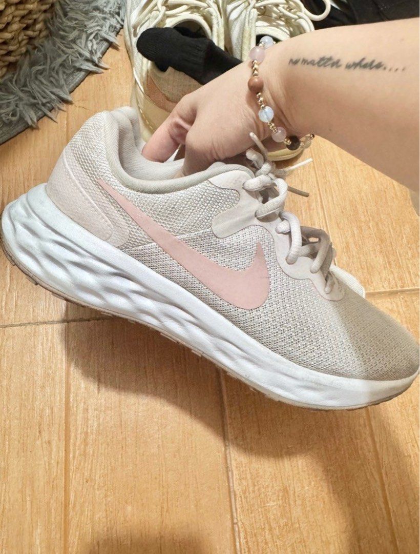 Nike Revolution Running Shoes Light Pink 38 (Category: Sneakers) located in Cainta. Submitted by el.declutterz (Listing ID 1389995652, Image 1). Description: rfs: decluttering.