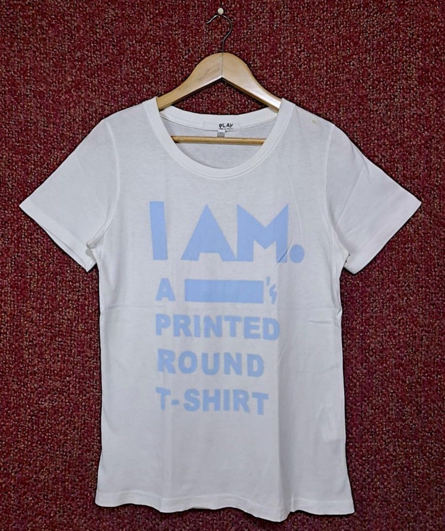 PLAY COMME des GARCONS Spell Out (Category: Luxury Apparel) located in Quezon City. Submitted by yaseen73 (Listing ID 1390028502, Image 1). Description: CGD PLAY Scoop Neck Tee For Women With Big Prints Blue Prints Logo Short - Sleeved White |With Visible Stain ( See Last Photo ) WASHABLE •Made in Japan Size Medium on Tag Width *17½ Inches Length 26 Inches 10/10 Color Rate Like New Condition✓ NO HAIRLINE/NO CRACK PRINTS Asking Price : 400.00 Peso