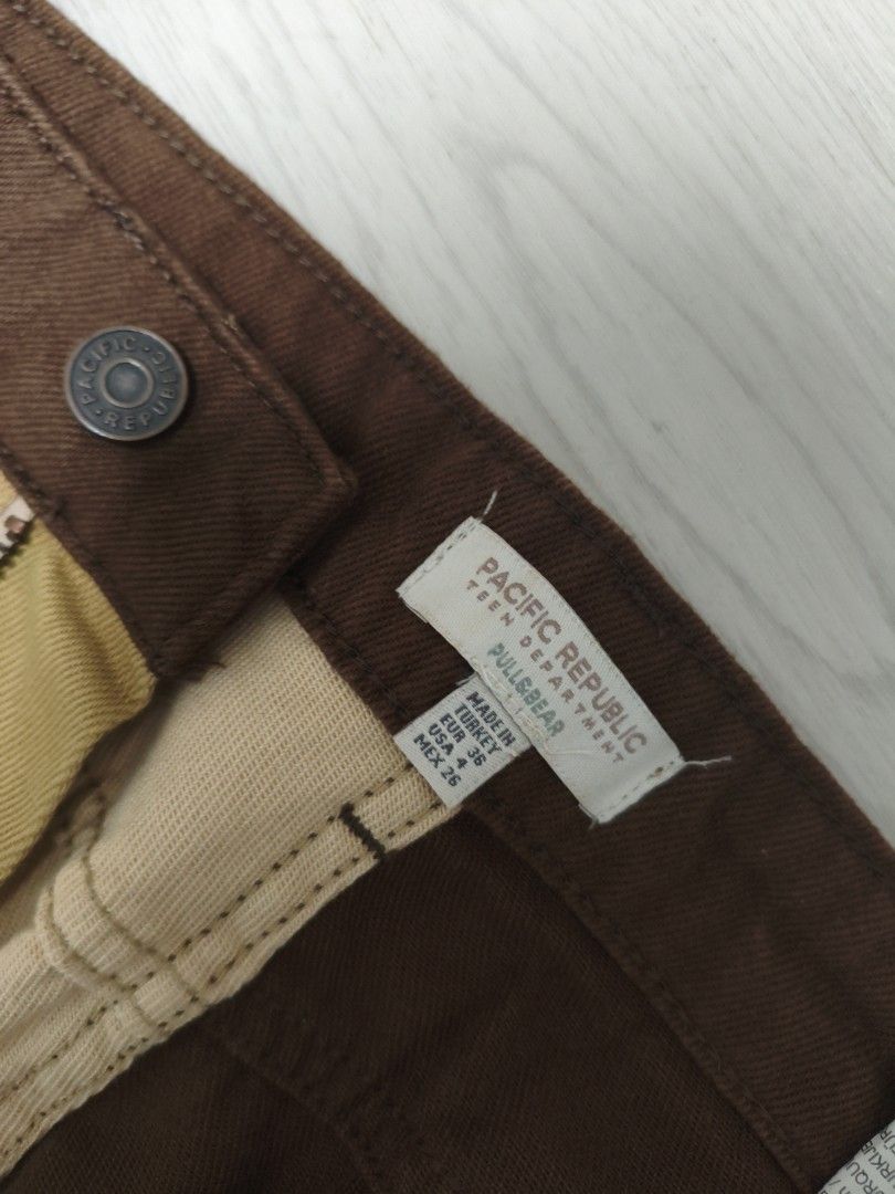Pull&Bear patchwork brown denim jeans (Category: Jeans & Leggings) located in Singapore. Submitted by felilicia (Listing ID 1389979608, Image 2). Description: - Pull&Bear patchwork jeans - fits S to M - Colour scheme: Brown, beige, and tan - Condition: Great, no flaws - Adds a pop of colour to your outfit!.