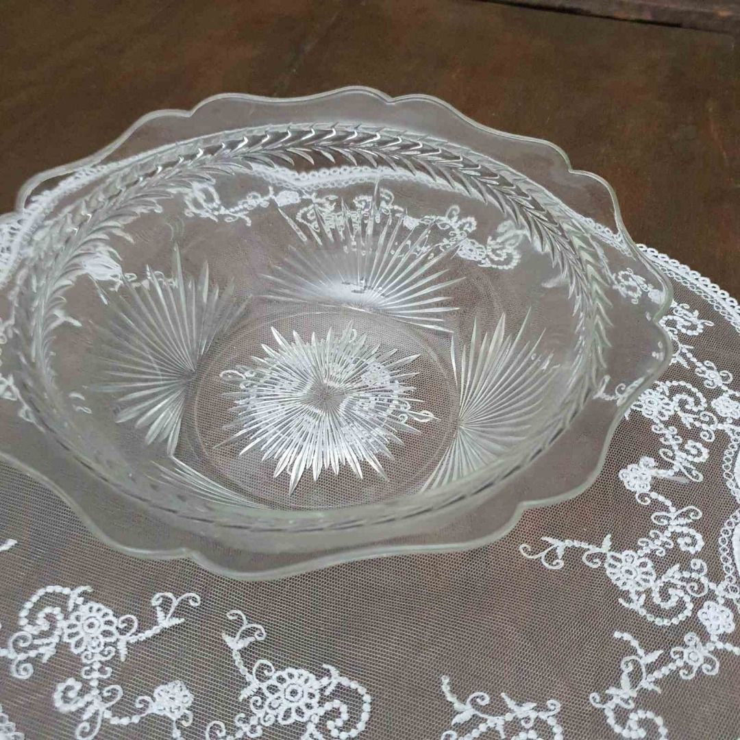 Rare Depression Glass in Sunburst Pattern (Category: Dinnerware & Cutlery) located in Pasig City. Submitted by fine.finds (Listing ID 1389937468, Image 3). Description: This is a Sunburst Clear Depression Glass Serving Platter crafted by Jeannette Glass in the 1930s era. Its central sunburst motif radiates through a scalloped rim, turning everyday serving into a luminous display piece - perfect for both nostalgic collectors and stylish hosts alik