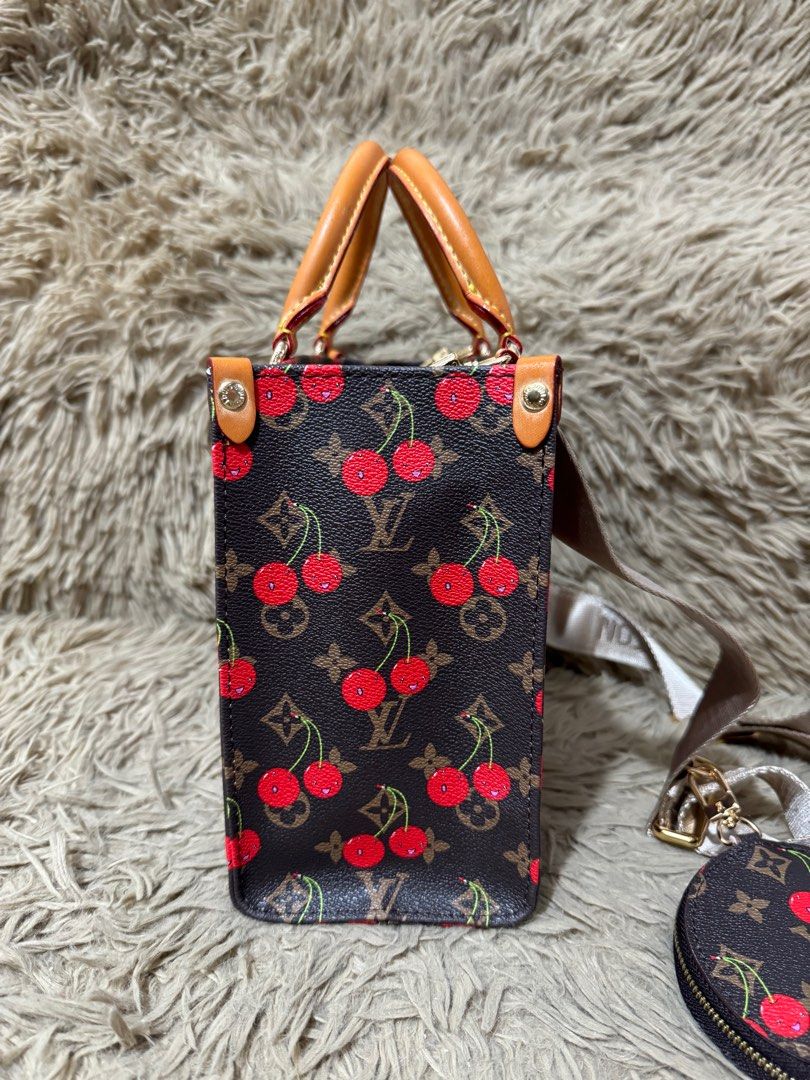 Tote bag (Category: Luxury Bags & Wallets) located in Angeles City. Submitted by mosh_naik (Listing ID 1389952758, Image 3). Description: Lv On The Go cherry Tite Bag With coin purse Small size Good as new.