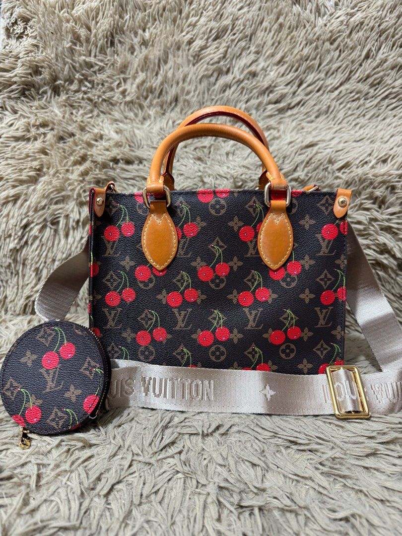Tote bag (Category: Luxury Bags & Wallets) located in Angeles City. Submitted by mosh_naik (Listing ID 1389952758, Image 2). Description: Lv On The Go cherry Tite Bag With coin purse Small size Good as new.