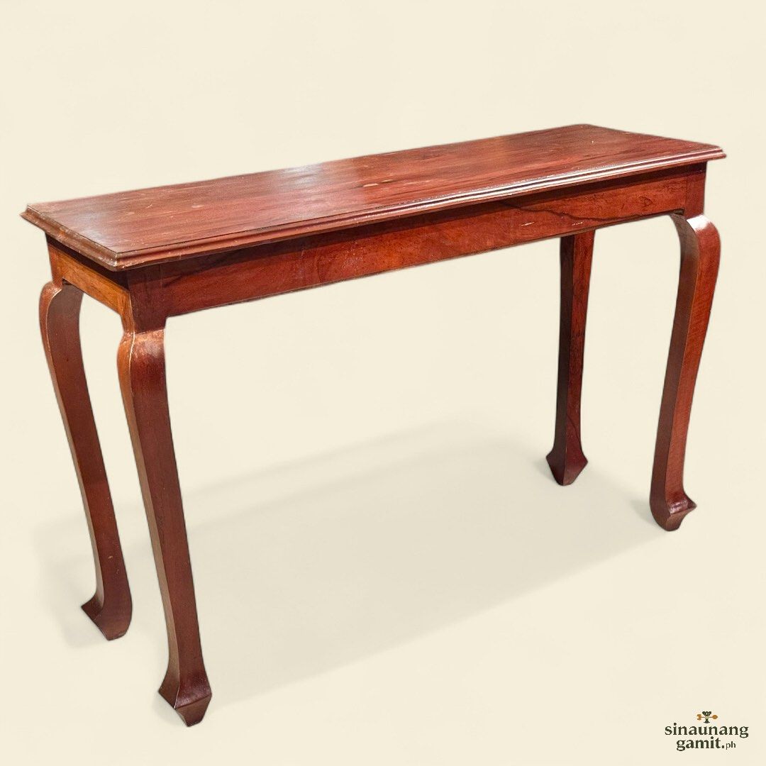 Vintage Kamagong Console Table (Category: Tables & Sets) located in Manila. Submitted by sinaunang_gamit (Listing ID 1389896104, Image 2). Description: Vintage Kamagong Console Table Length: 48 inches Height: 32 inches Width: 16 inches Sturdy and ready to use 4pcs available 9500 each.