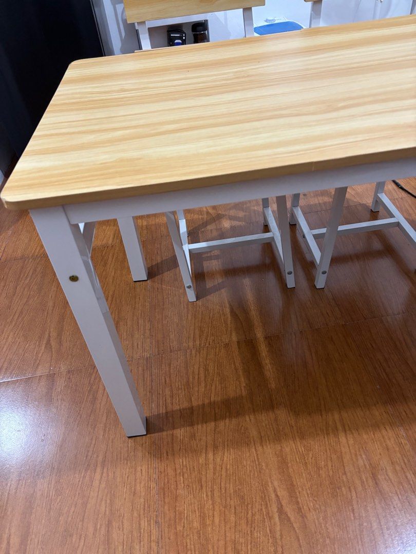 4 seater dining set (Category: Tables & Sets) located in Rizal. Submitted by declutteryarn (Listing ID 1384759668, Image 3). Description: 4 seater dining set team kahoy team puti minimalist materials: MDF + steel frame dimensions: Table: 120*70*74cm Chair: 82.5*39*42.5cm with minor issues sa corner but does not affect performance complete 4 chairs can disassemble before you pick up pero wala na manual.