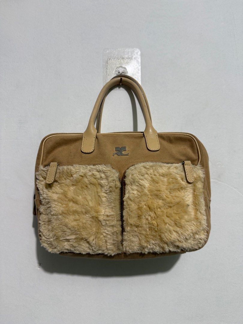 Courreges bag (Category: Luxury Bags & Wallets) located in Sorsogon. Submitted by jovert_23alviz (Listing ID 1384806076, Image 1). Description: Excellent condition Need clean lang.