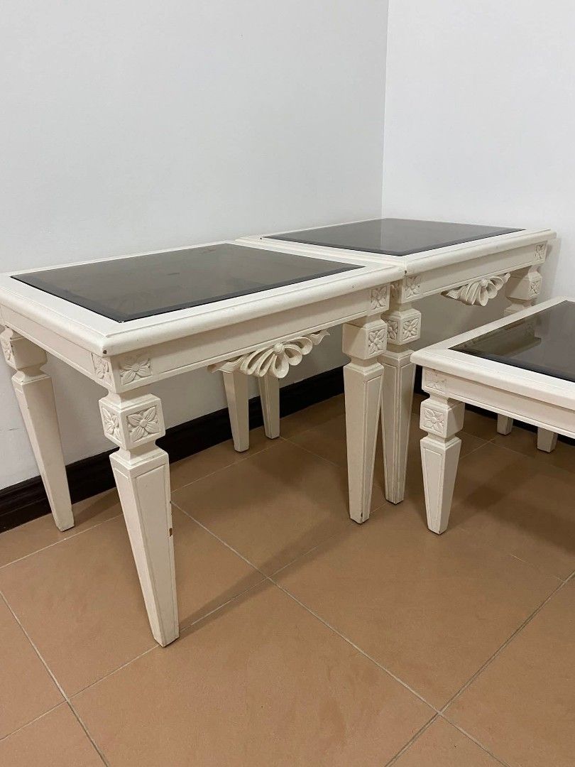 Elegant Wooden & Glass Coffee Table and Side Table Set (Category: Tables & Sets) located in Manila. Submitted by secondhomegifts (Listing ID 1384774875, Image 2). Description: Elegant Wooden & Glass Coffee Table and Side Table Set Bought: 18k as a set Selling: 10k if Set (negotiable for sure buyers) - Side Table Only 4k each - Coffee Table Only 6k, RFS: Decluttering Notes: in great condition, check photos for reference. Dimensions: Coffee Table L