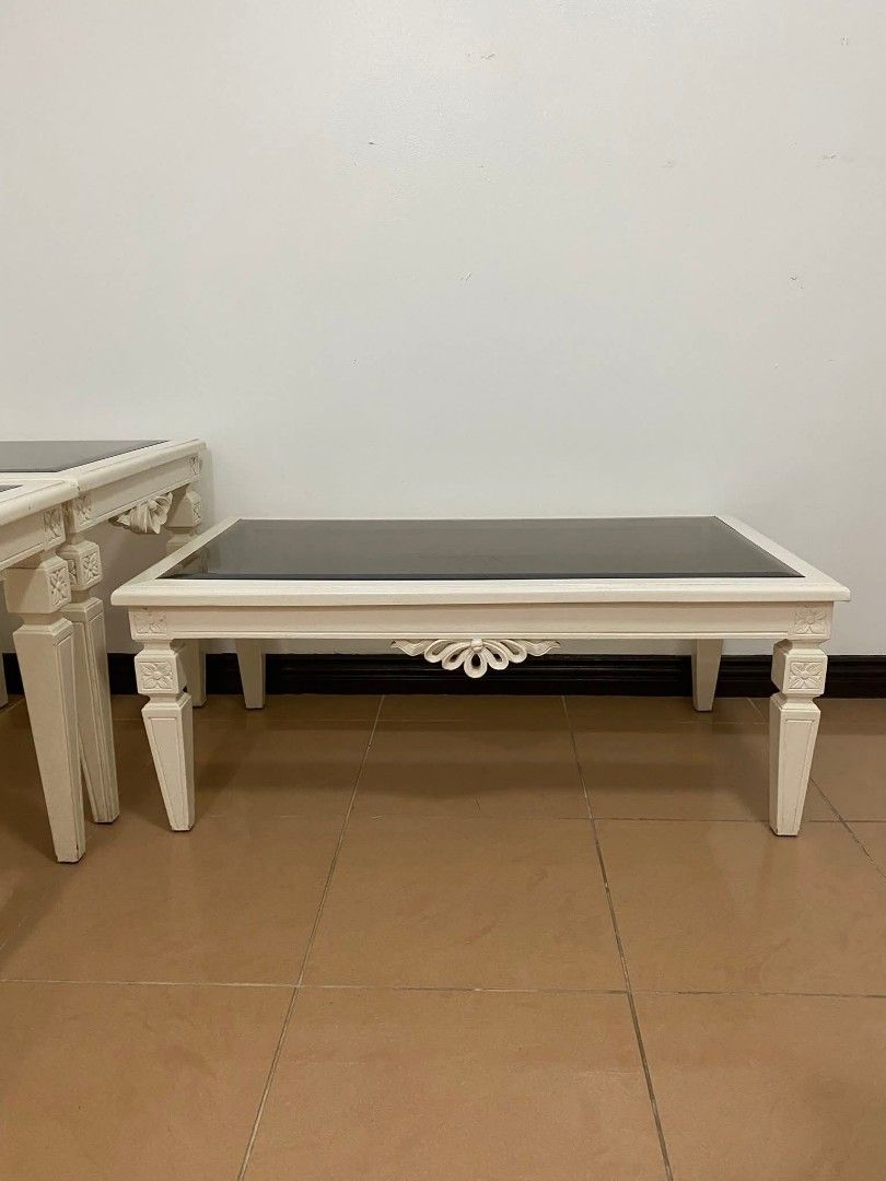Elegant Wooden & Glass Coffee Table and Side Table Set (Category: Tables & Sets) located in Manila. Submitted by secondhomegifts (Listing ID 1384774875, Image 3). Description: Elegant Wooden & Glass Coffee Table and Side Table Set Bought: 18k as a set Selling: 10k if Set (negotiable for sure buyers) - Side Table Only 4k each - Coffee Table Only 6k, RFS: Decluttering Notes: in great condition, check photos for reference. Dimensions: Coffee Table L