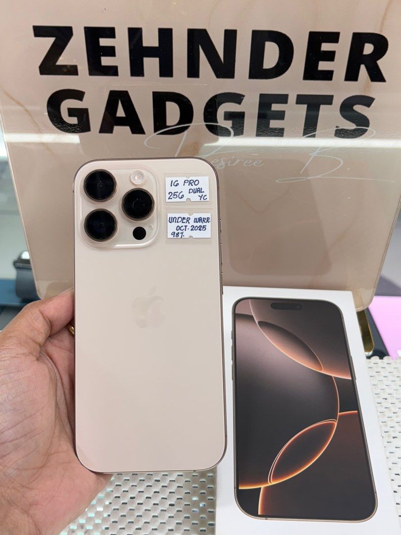 iPhone 16 PRO 256GB OPENLINE (DUAL SIM) HK VARIANT (Category: iPhone 16 Series) located in San Juan City. Submitted by desireebayal96 (Listing ID 1384688788, Image 1). Description: iPhone 16 PRO (DESERT TITANIUM) * UNDER WARRANTY UNTIL OCT. 2025 * DUAL SIM (HK VARIANT) * OPENLINE * ANY SIM * 256GB * 98% BATTERY HEALTH * 251 CYCLE COUNT * 98% SMOOTH * NO DENTS * NO ISSUE * NO HISTORY OF REPAIR * NOT REFURBISHED * WITH BOX SAME SERIAL * WITH CORD T