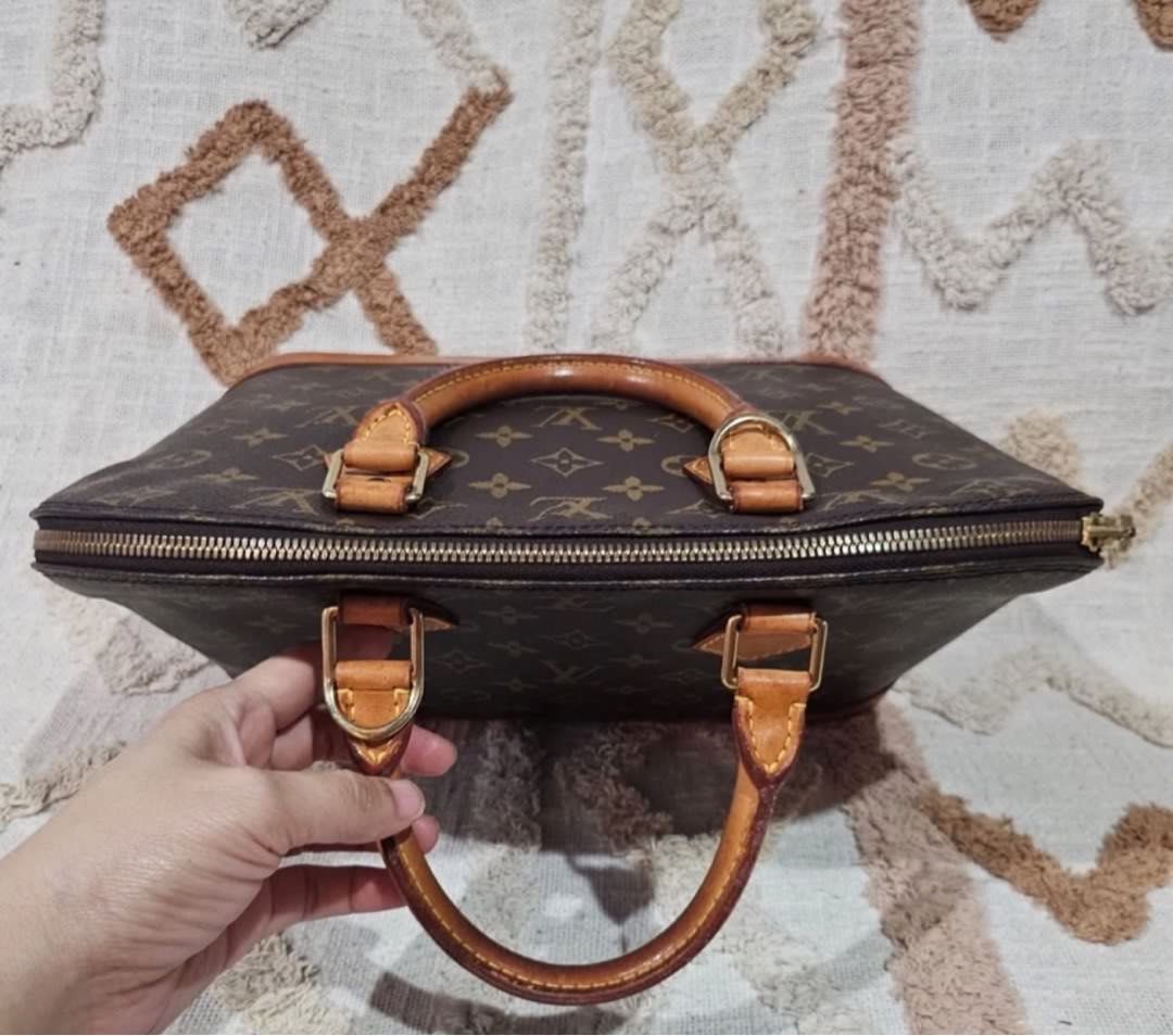 LV Alma PM (Category: Luxury Bags & Wallets) located in Muntinlupa City. Submitted by Jessa (Listing ID 1384696765, Image 3). Description: L.V Alma PM Date Code: BA 0926 Made in France 🔸️The monogram canvas is clean, and is still in good condition, monogram design is still clear, shows normal signs of usage, normal wear and tear. Handles and bottom vachetta turn honey patina with watermarks, some stains, light scratches, handles shows superficia