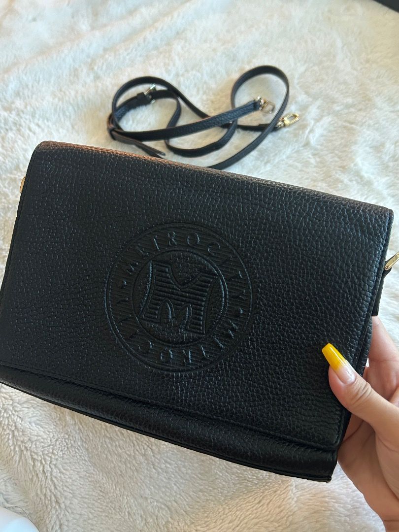 Metrocity sling bag (Category: Luxury Bags & Wallets) located in Paranaque City. Submitted by shy_kor (Listing ID 1384724599, Image 1). Description: MetroCity sling bag Lightly used Minimal sign of usage RFS: decluttering .
