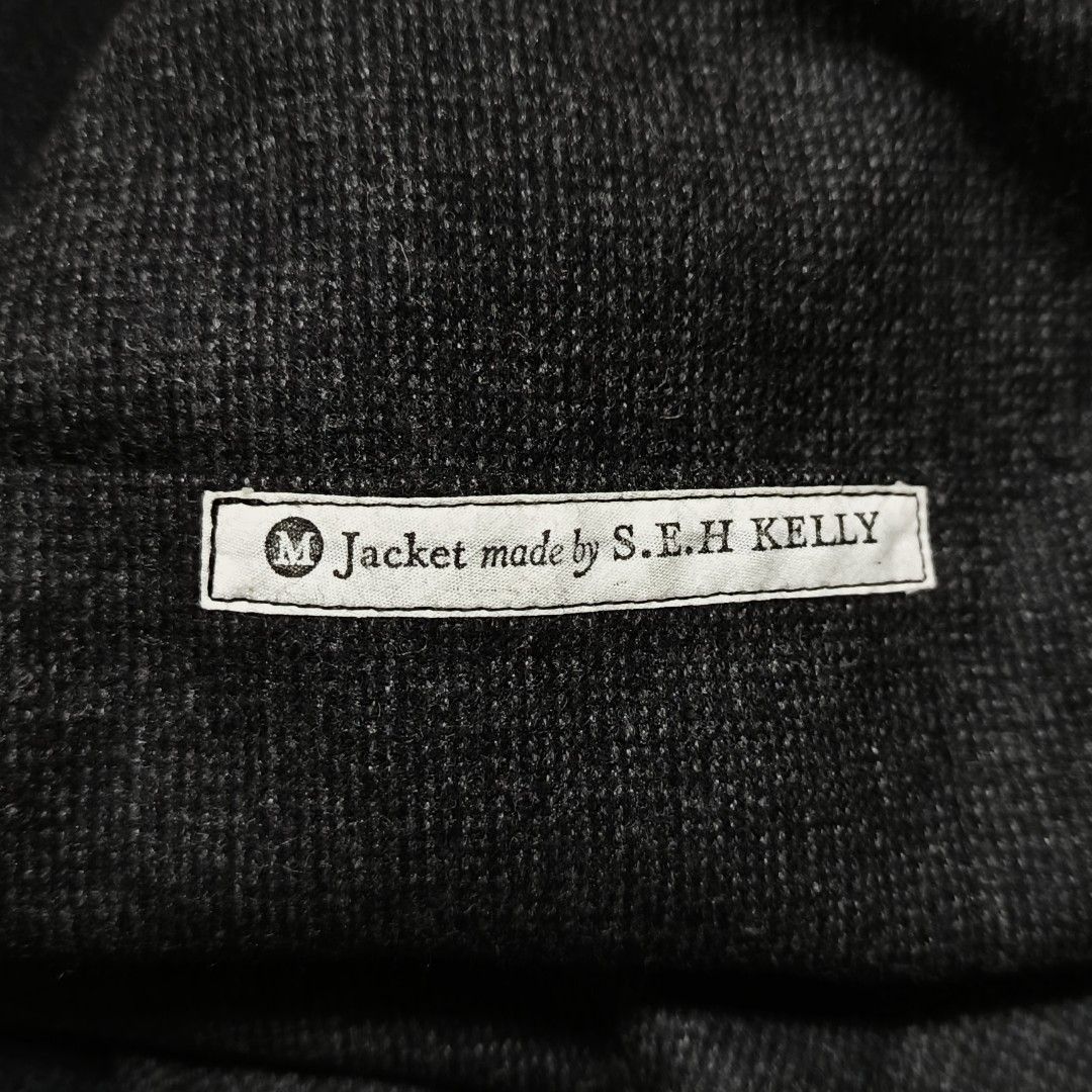 S.E.H. Kelly Charcoal Black Wool Cashmere Work Jacket (Category: Coats, Jackets and Outerwear) located in Dinalupihan. Submitted by brokencasket (Listing ID 1384762898, Image 2). Description: S.E.H. Kelly Charcoal Black Wool Cashmere Work Jacket Price: 15,000🏷 S.E.H Kelly is a British menswear brand known for its unassuming, timeless, and high-quality clothing, with a focus on British fabrics and tailoring. The brand emphasizes classic styles, d