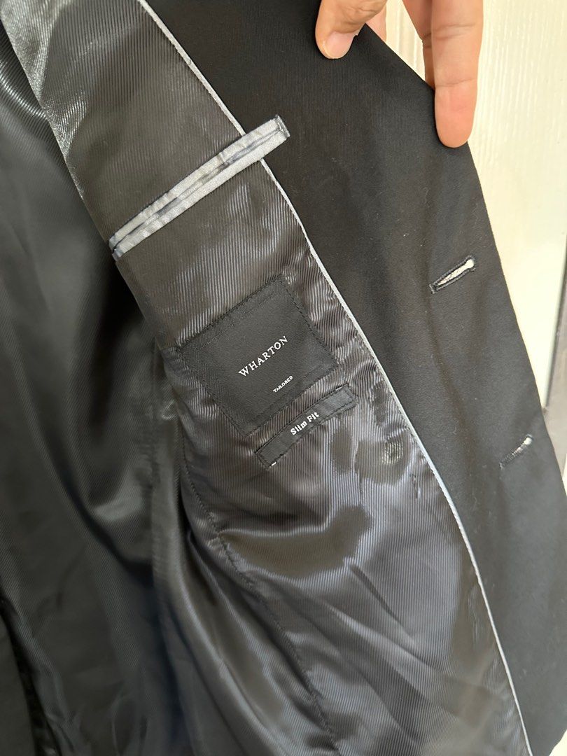 Wharton black coat for sale (small to medium) (Category: Coats, Jackets and Outerwear) located in Taguig. Submitted by ejdangla (Listing ID 1384733698, Image 3). Description: Selling my pre-loved blazer from Wharton. Dry cleaning maintained. No hanger and suit cover. Please check the photos for more info. RFS: It doesn't fit me anymore. MOP: Cash, GCash, Maya, bank transfer Shipping c/o buyer. .
