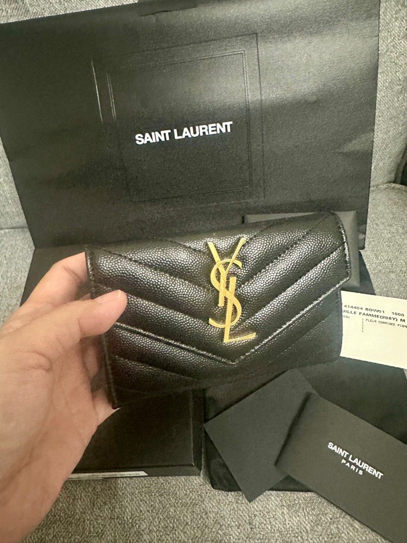 YSL Card Holder (Category: Luxury Bags & Wallets) located in Lipa City. Submitted by mariegaring (Listing ID 1384738750, Image 1). Description: Good as new. I just bought the wrong item — I was supposed to get a slim card holder, but this one is actually a wallet with card slots. It’s too thick for my slim bag. I only need a slim one..
