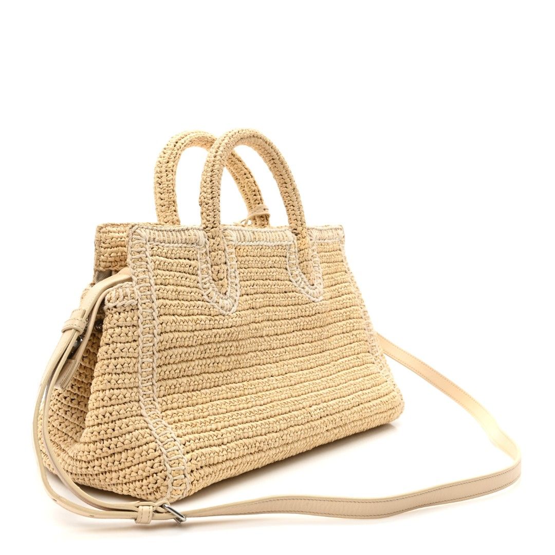 YSL RAFFIA SMALL RIVE GAUCHE CABAS NATURALE (Category: Luxury Bags & Wallets) located in Iloilo. Submitted by primefinds (Listing ID 1384692858, Image 2). Description: This is an authentic SAINT LAURENT Raffia Small Rive Gauche Cabas in Naturale. This handbag is crafted of woven straw in beige with leather accents. The bag features woven top handles and a removable, adjustable leather shoulder strap. The top zipper opens to a matching fabric inte