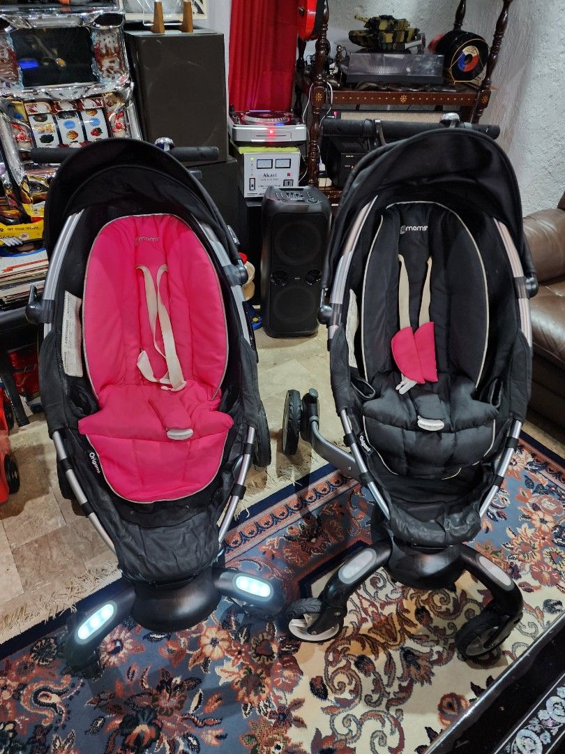 4 moms origami (Category: Strollers) located in Paranaque City. Submitted by manilagolfmarket (Listing ID 1385010461, Image 2). Description: For Sale 4 Moms Origami automatic folding stroller *4 moms Pink seat cover working but manual unfold 12.9k with free seat cover *4 moms Black seat cover broken batt. Manual folding only with broken handle 8.8k pick up Bf Paranaque or.